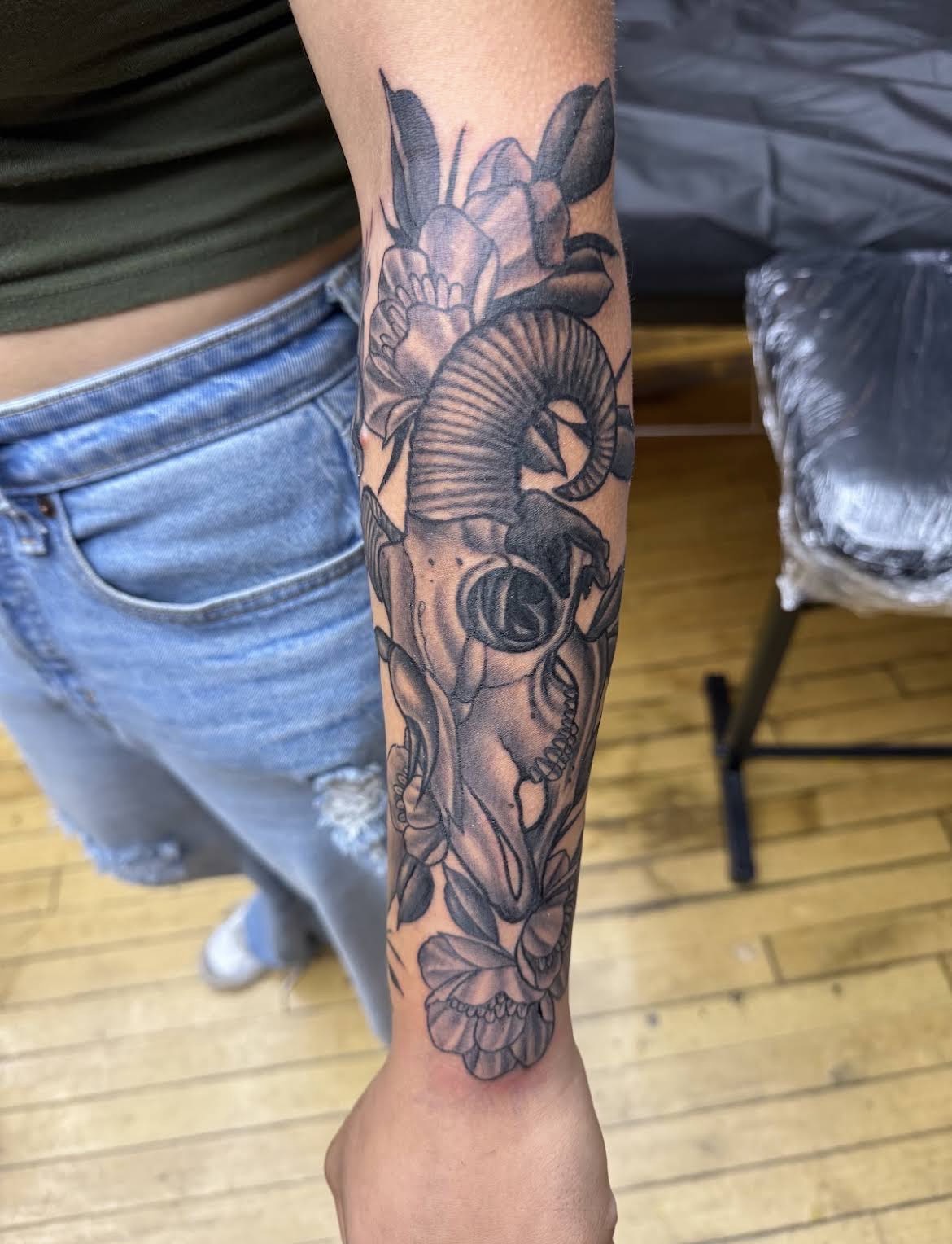 Ram skull and florals forearm sleeve